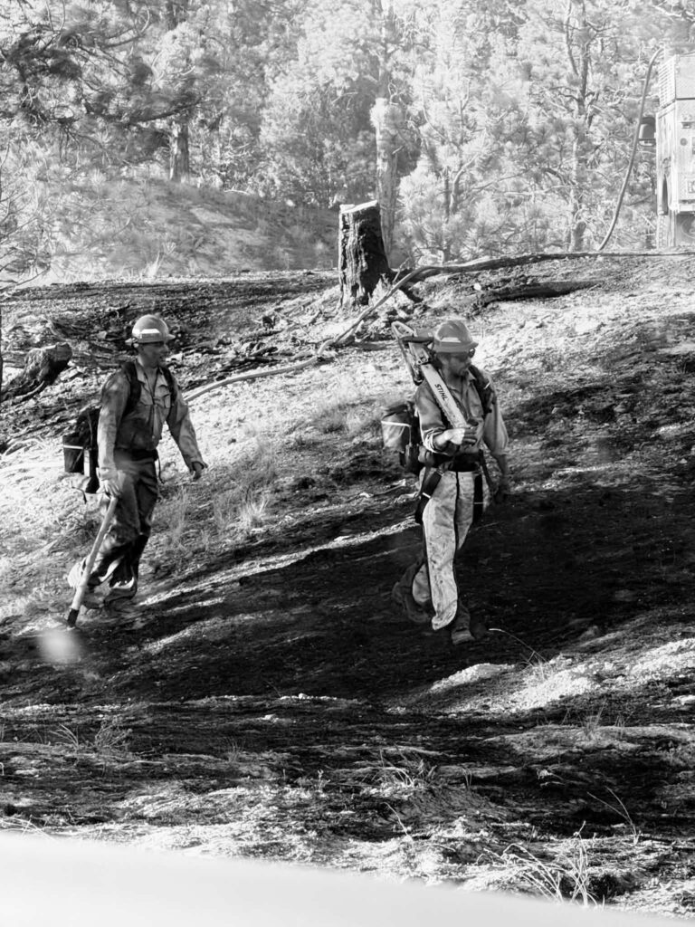 Firefighters working the fire line